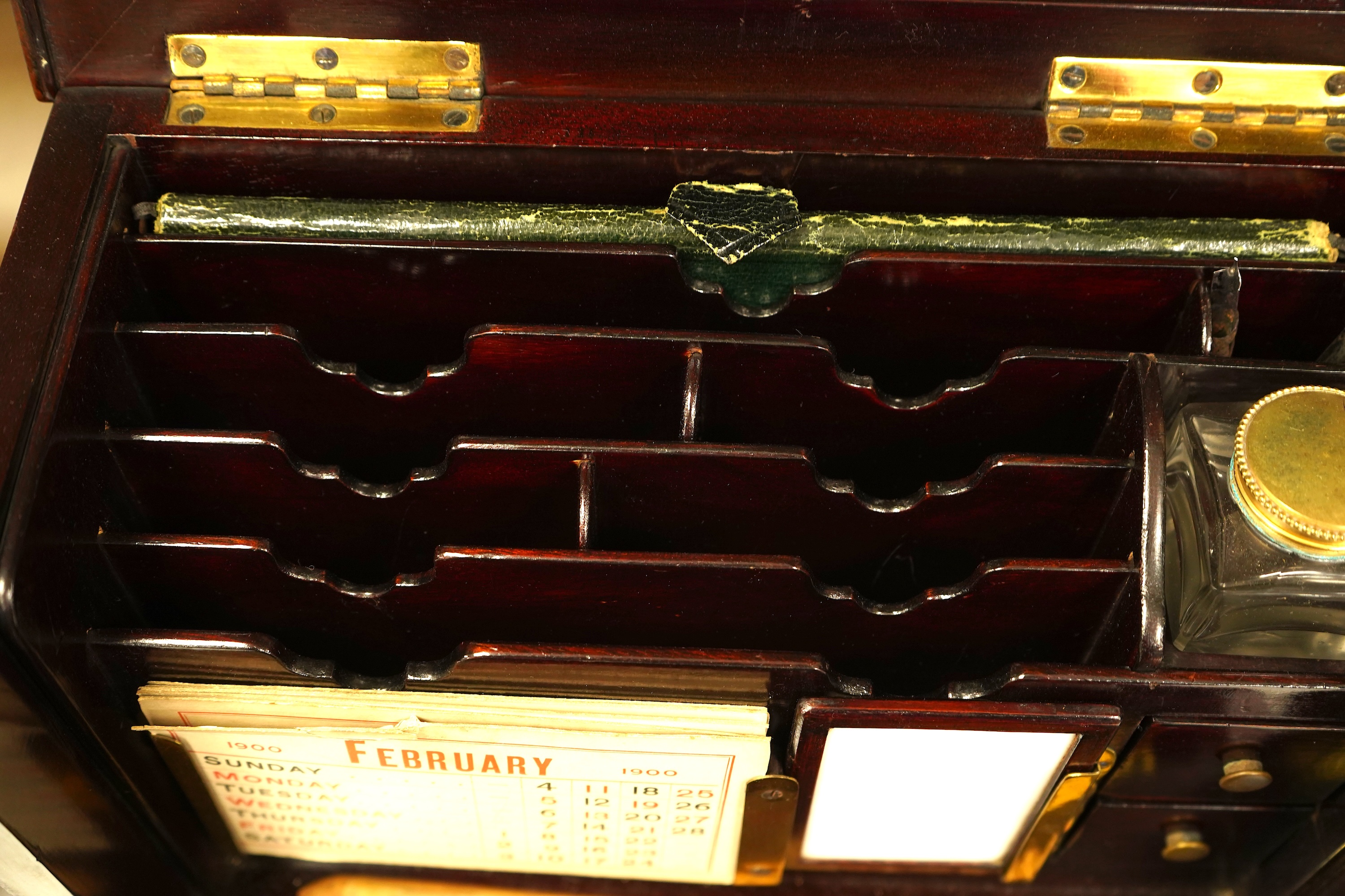 An Edwardian inlaid mahogany writing casket with fitted interior and a late Victorian faded walnut cigar box, largest 32cm wide